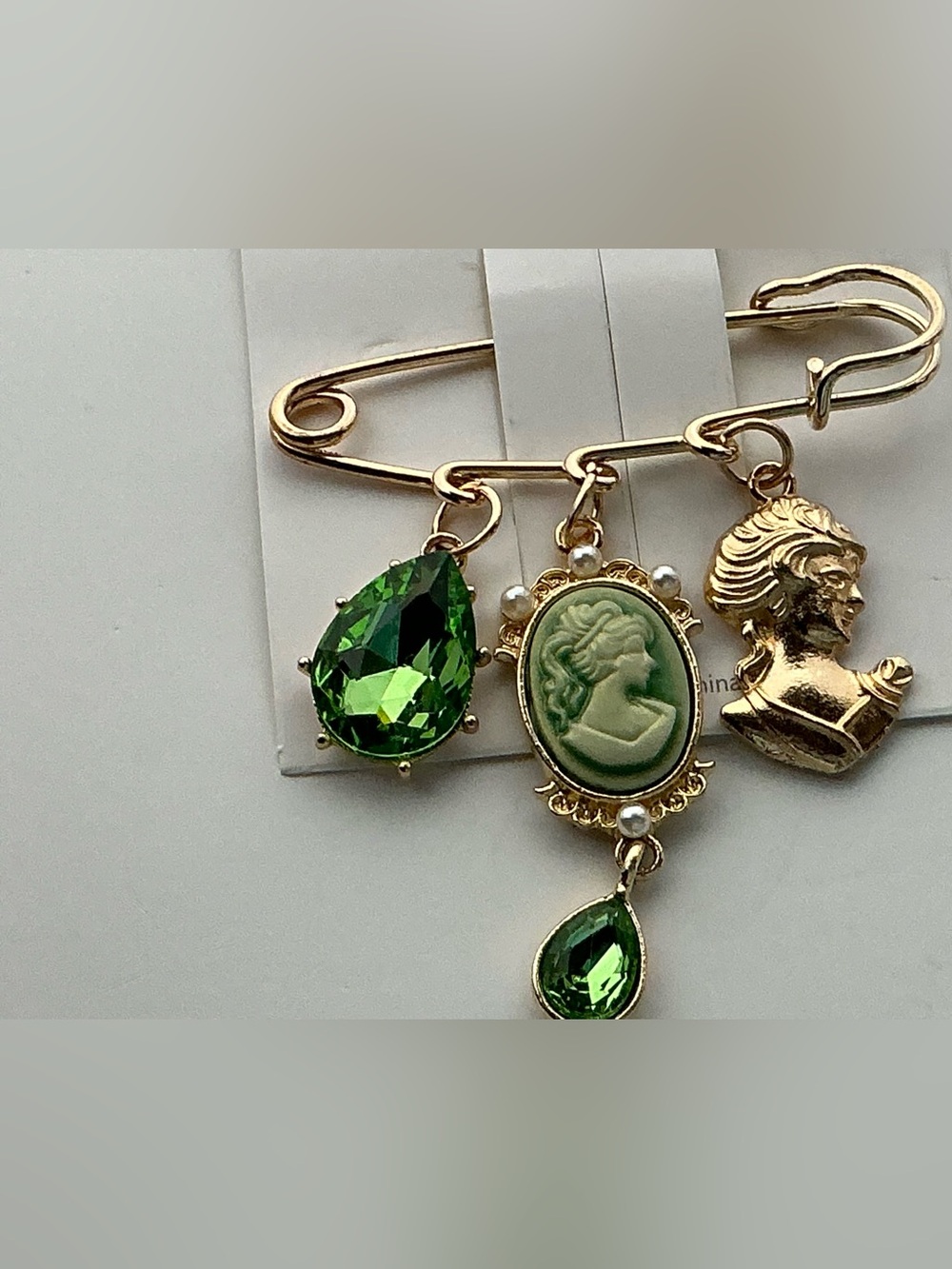 Gold-tone Brooch Pin with Green Gem and Cameo Charm